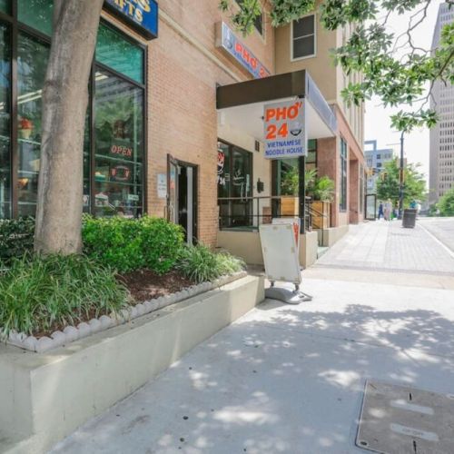 Street Level has Liquor Store/Convenience Store and 24hr Pho Resturant