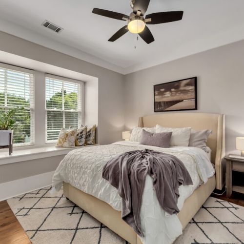 Second Bedroom (Queen) w ceiling fan and skyline views
