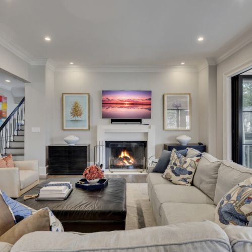 Inviting lounge w/ fireplace & soft seating, perfect for cozy evenings