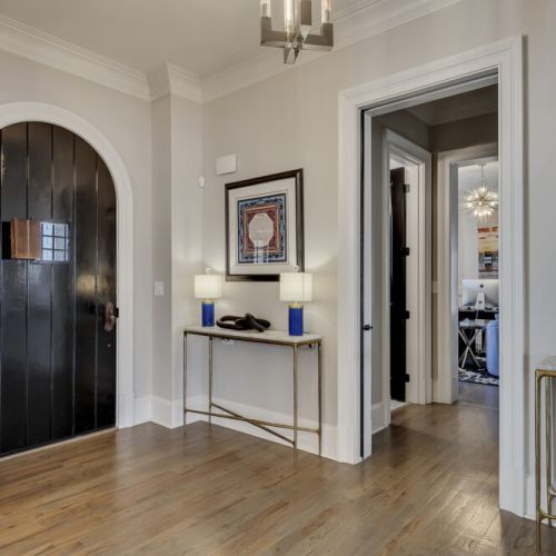 Welcoming entryway w/ console table & decor, setting a warm first impression