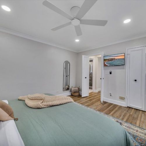 Bedroom w King Hybrid Mattress and Smart TV