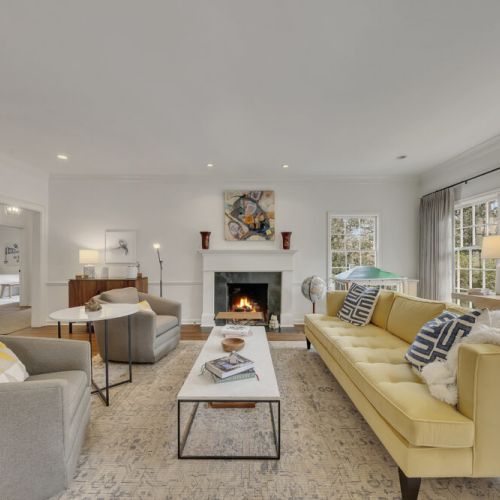 Inviting living room w/ fireplace as a warm, central focal point