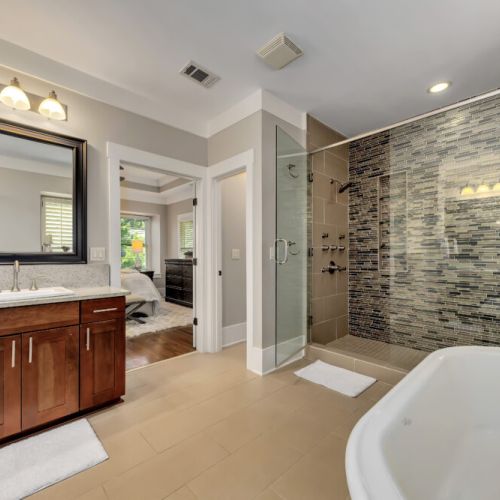 Enormous walk in shower w dual shower head on opposite ends