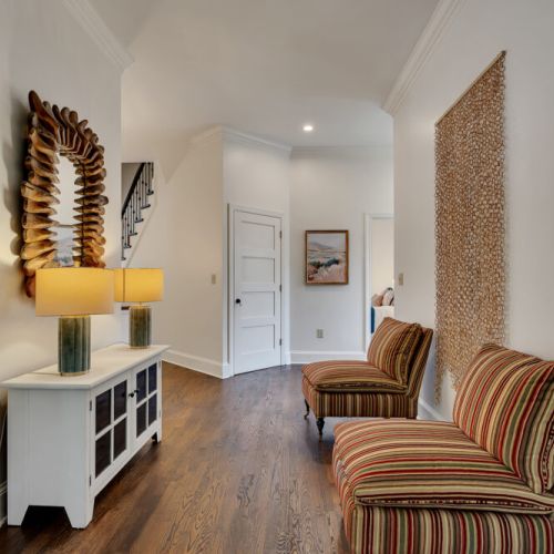 featuring striped chaise lounges,