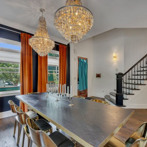 The accompanying dining chairs have modern