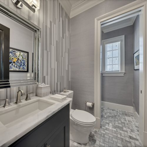 Full bath w/ sink vanity & glass shower for a clean, modern feel
