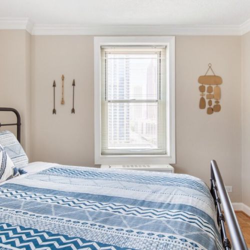 Bedroom with a large mirror - King Bed
