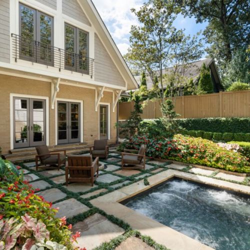 Private courtyard w/ lounge seating & greenery for relaxed outdoor moments