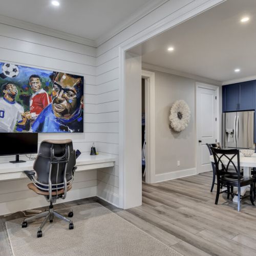 Media center w/ built-in seating & TV, a cozy spot for movies or games