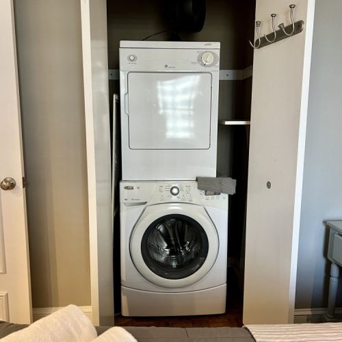 Washer/ dryer in the bedroom.