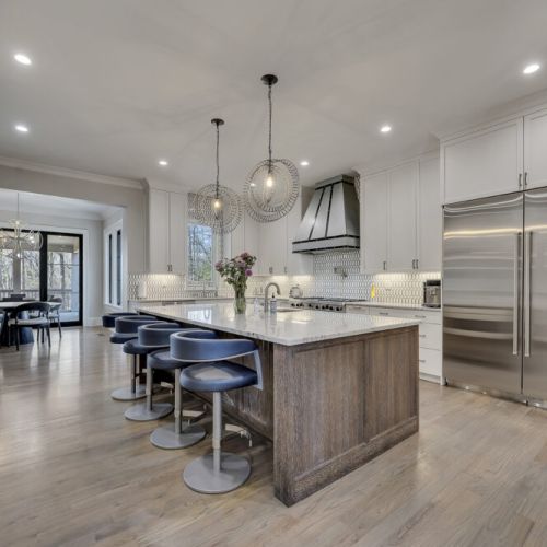 Modern kitchen w/ large island seating, great for casual meals & conversation