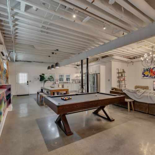 Game on! This basement is the ultimate hangout spot
