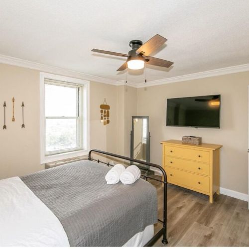 Bedroom with a full length mirror - King Bed