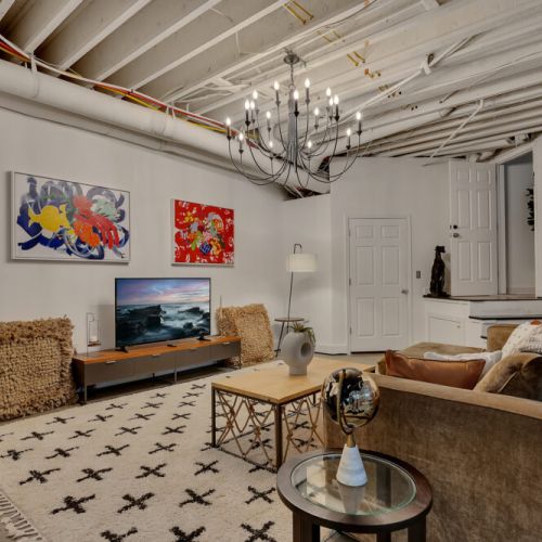 colorful graffiti wall and the industrial-chic ceiling.