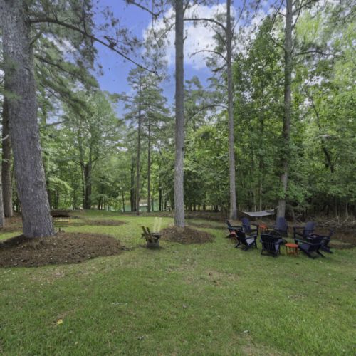 Multiple spaces for relaxing, surrounded by mature trees