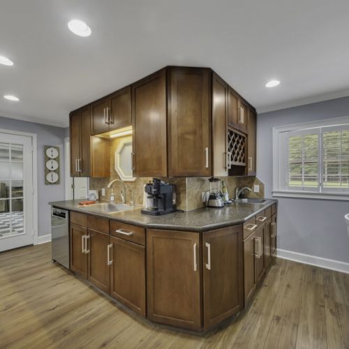 Abundant solid wood cabinetry offering excellent storage