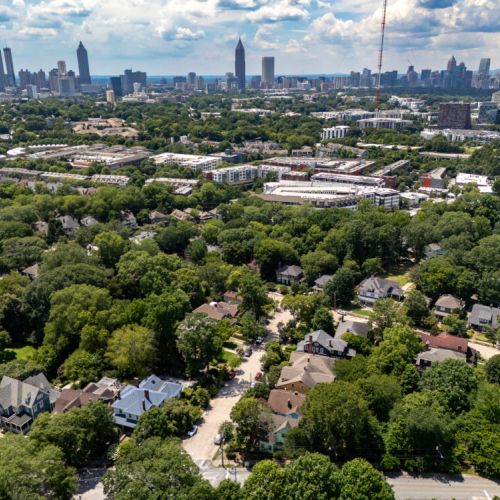 lush, mature landscaping under a sunny sky.