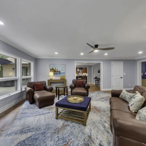 Modern ceiling fans and recessed lighting throughout