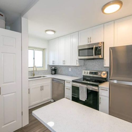 Open kitchen with quartz counter tops