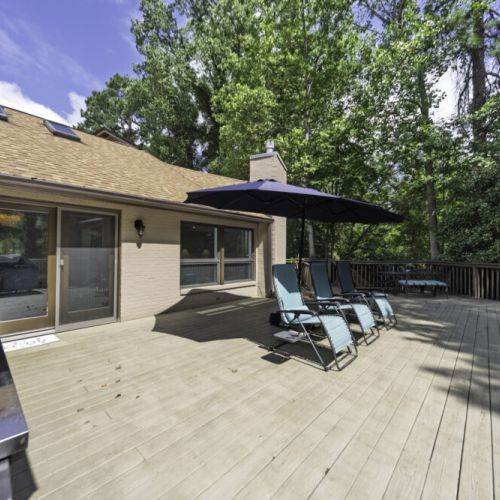 Outdoor lounge chairs & umbrellas for sunbathing or relaxing