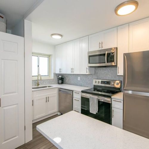 Open kitchen with quartz counter tops