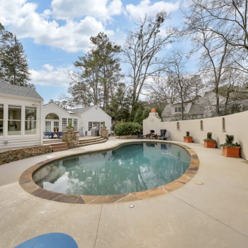 Private pool area w/ curved design & peaceful, tucked-away feel