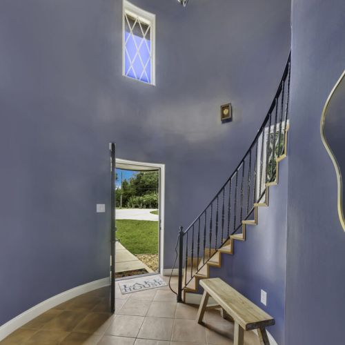 Grand two-story entryway with soaring ceilings