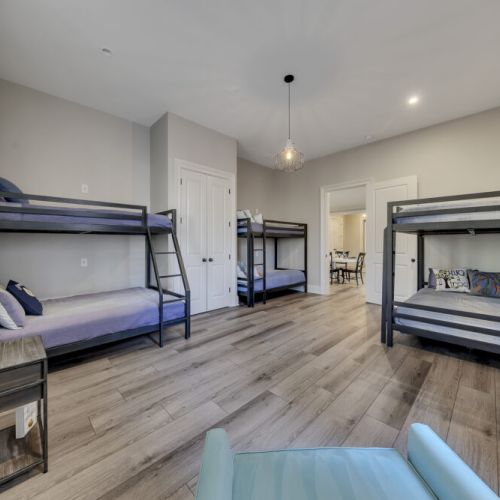 Bunk room w/ multiple beds, a fun & practical space for groups or kids