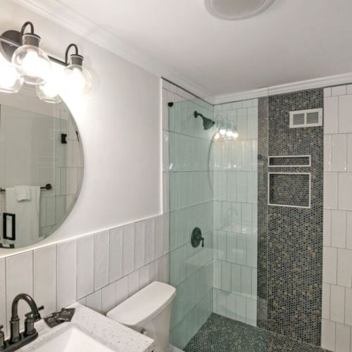 Sparking clean bathroom with a shower.