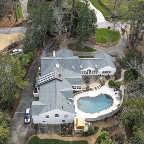 Bird’s-eye view highlighting the property & spacious outdoor areas
