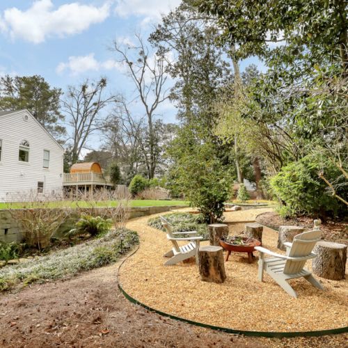 Garden seating area surrounded by greenery for peaceful moments
