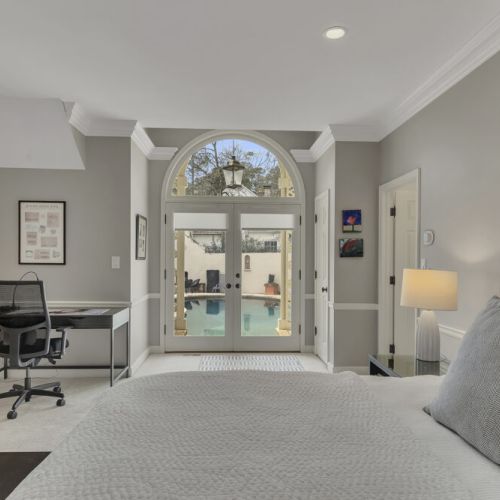 Private bedroom access leading directly to backyard & pool area