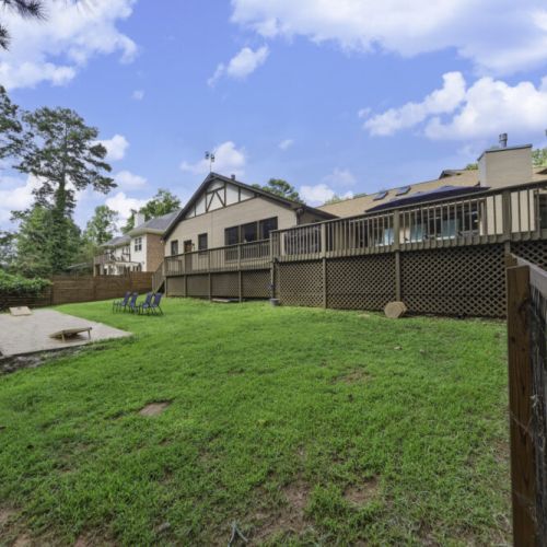 Multiple spaces for relaxing, surrounded by mature trees