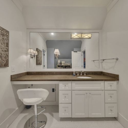 Bathroom 2- Extra-long vanity counter perfect for personal items or makeup setup.