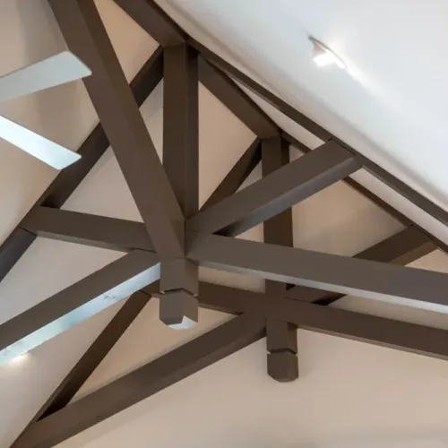Vaulted ceilings w/ exposed beams adding depth & character