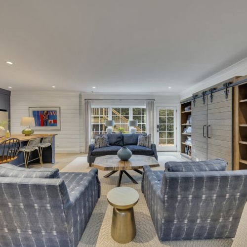 Basement Living Room - Cozy seating area 55 inch smart TV