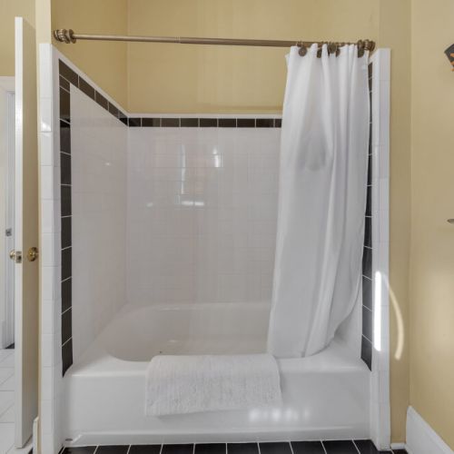 Bathroom 3 - Combined bathtub and shower.