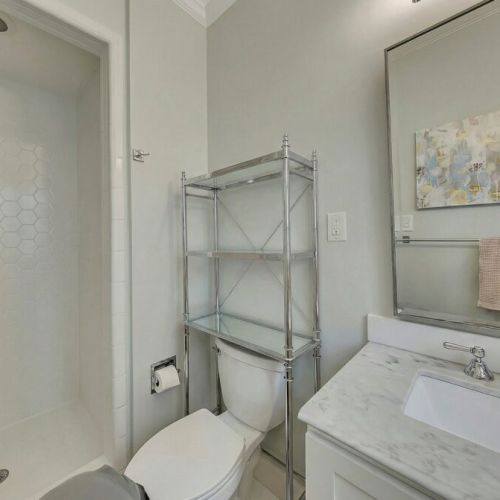 Bedroom 2 - en suite Bathroom, glass-enclosed shower with modern tile