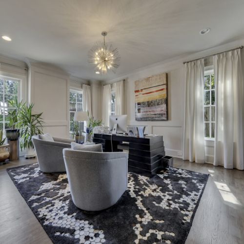 Quiet office space w/ large windows & desk, ideal for focus or remote work
