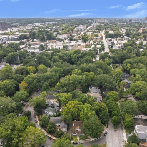 providing a full view of the property and its surrounding streets