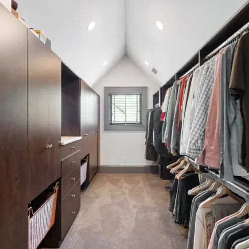 Large custom closet w/ built-in storage for easy organization