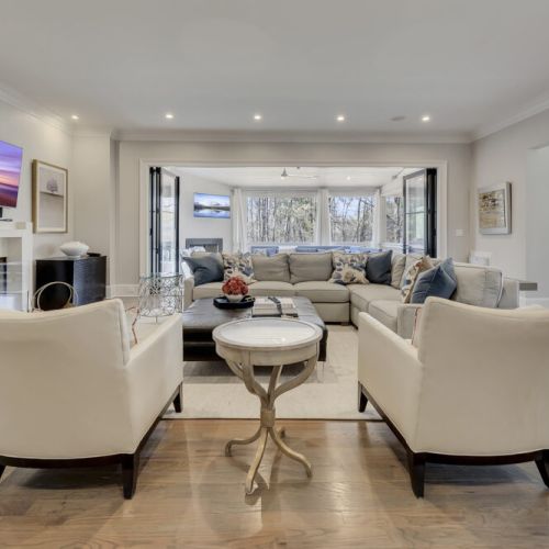Open living space w/ bar seating & cozy lounge area for easy entertaining