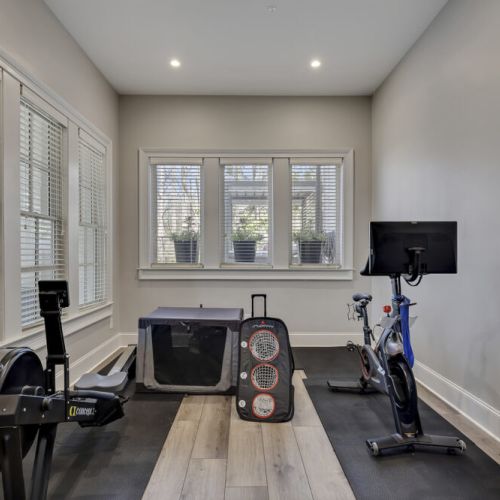 Bright bonus room w/ windows & workout equipment for active days