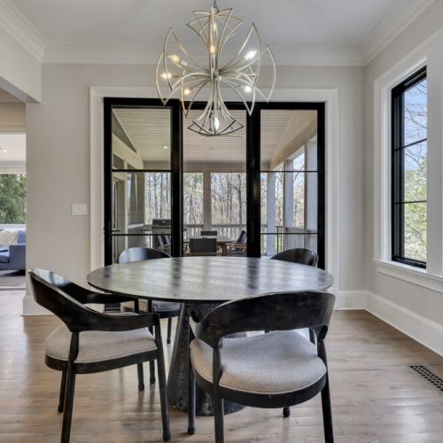 Cozy breakfast nook w/ round table & natural light for relaxed mornings