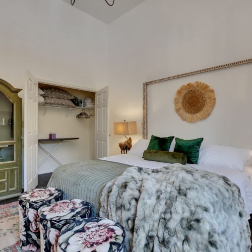 bedroom2 - dark wood floors, and a stunning vaulted ceiling