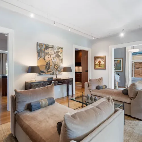 Bright living space w/ custom art accents & comfortable seating