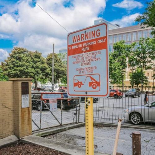 The main text indicates "15 MINUTE PARKING ONLY HERE"