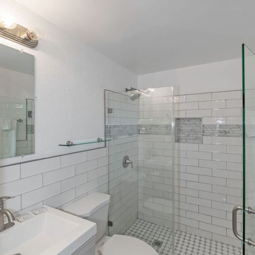 Sparking clean bathroom with a walk in shower
