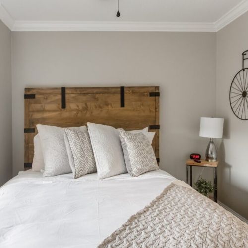 Master bedroom with a queen - bed