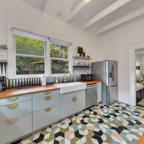 Unit 1 - Bright and modern kitchen with bold geometric floors
